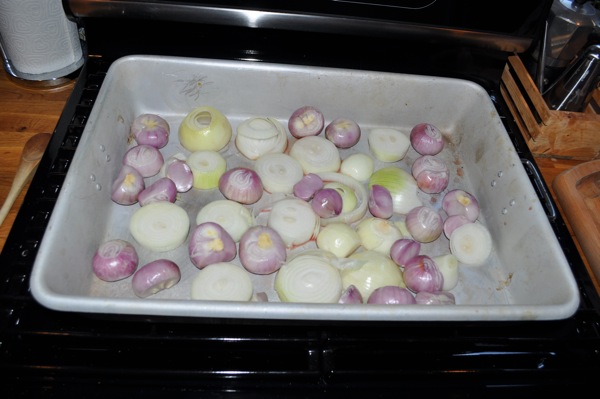 We didn't have a roasting rack big enough for Petunia, so we prepared a bed of onions and shallots...
